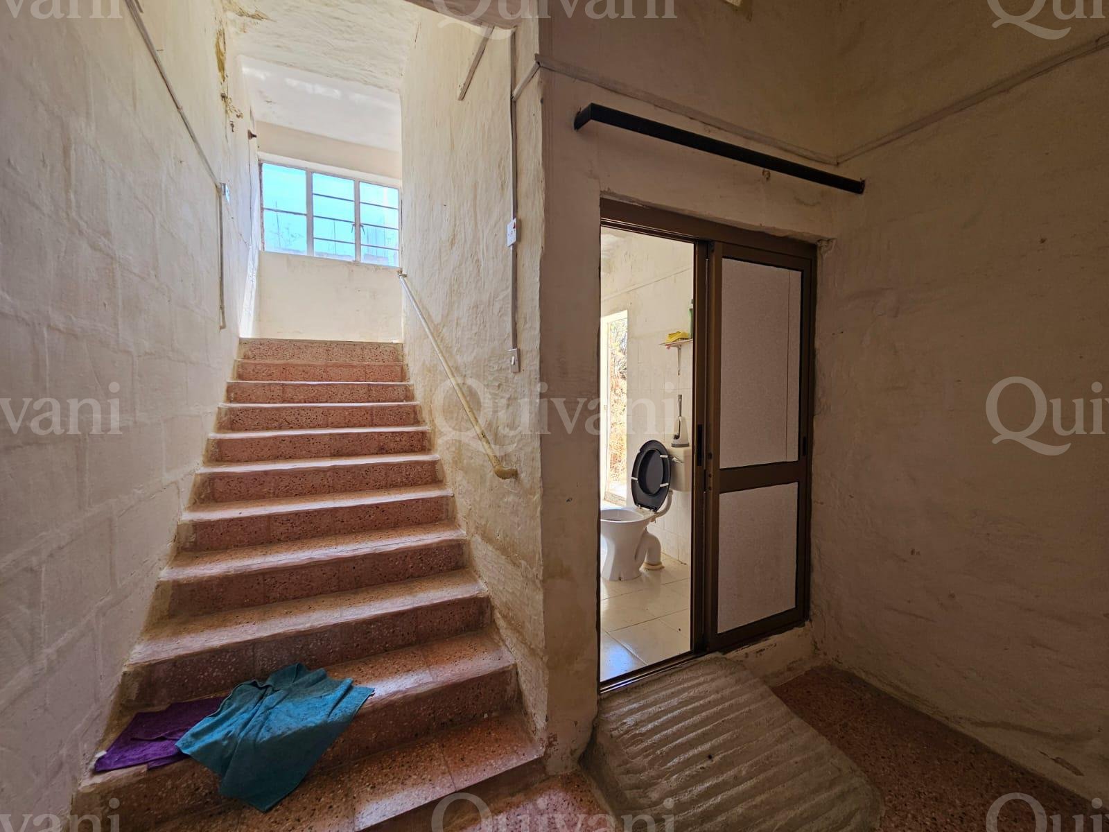 Semi-Detached Townhouse with Approved Permits for a Luxury 4-Bedroom Home