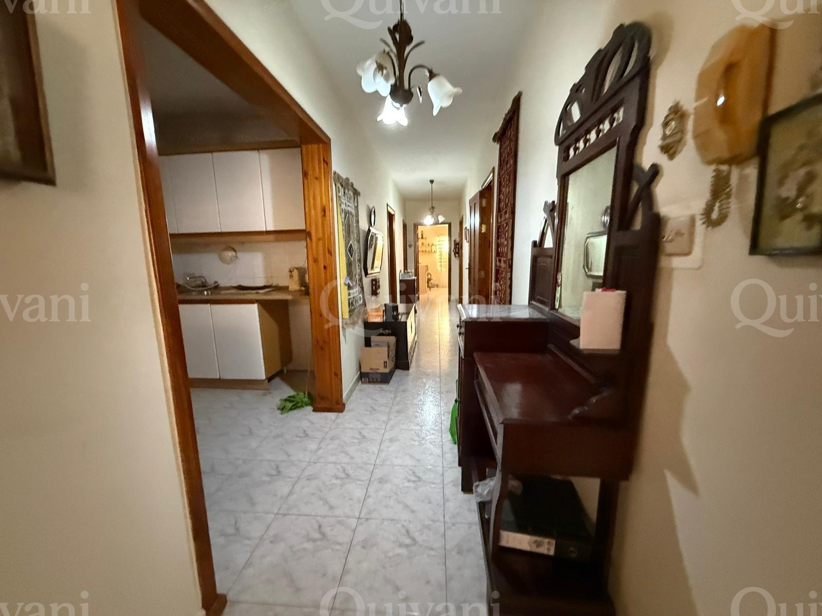 First floor apartment with an interconnecting street level garage and half ownership of airspace