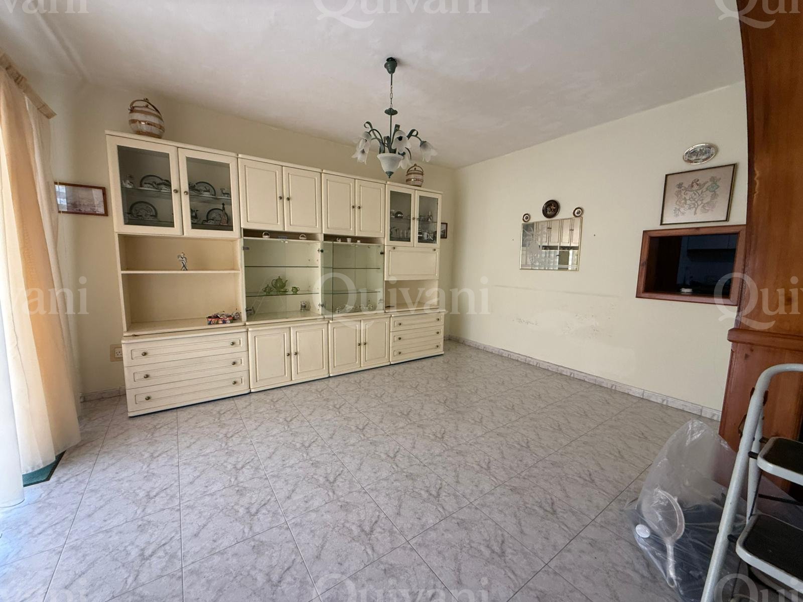 First floor apartment with an interconnecting street level garage and half ownership of airspace