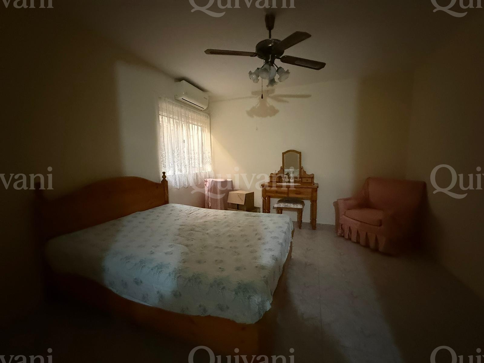 First floor apartment with an interconnecting street level garage and half ownership of airspace