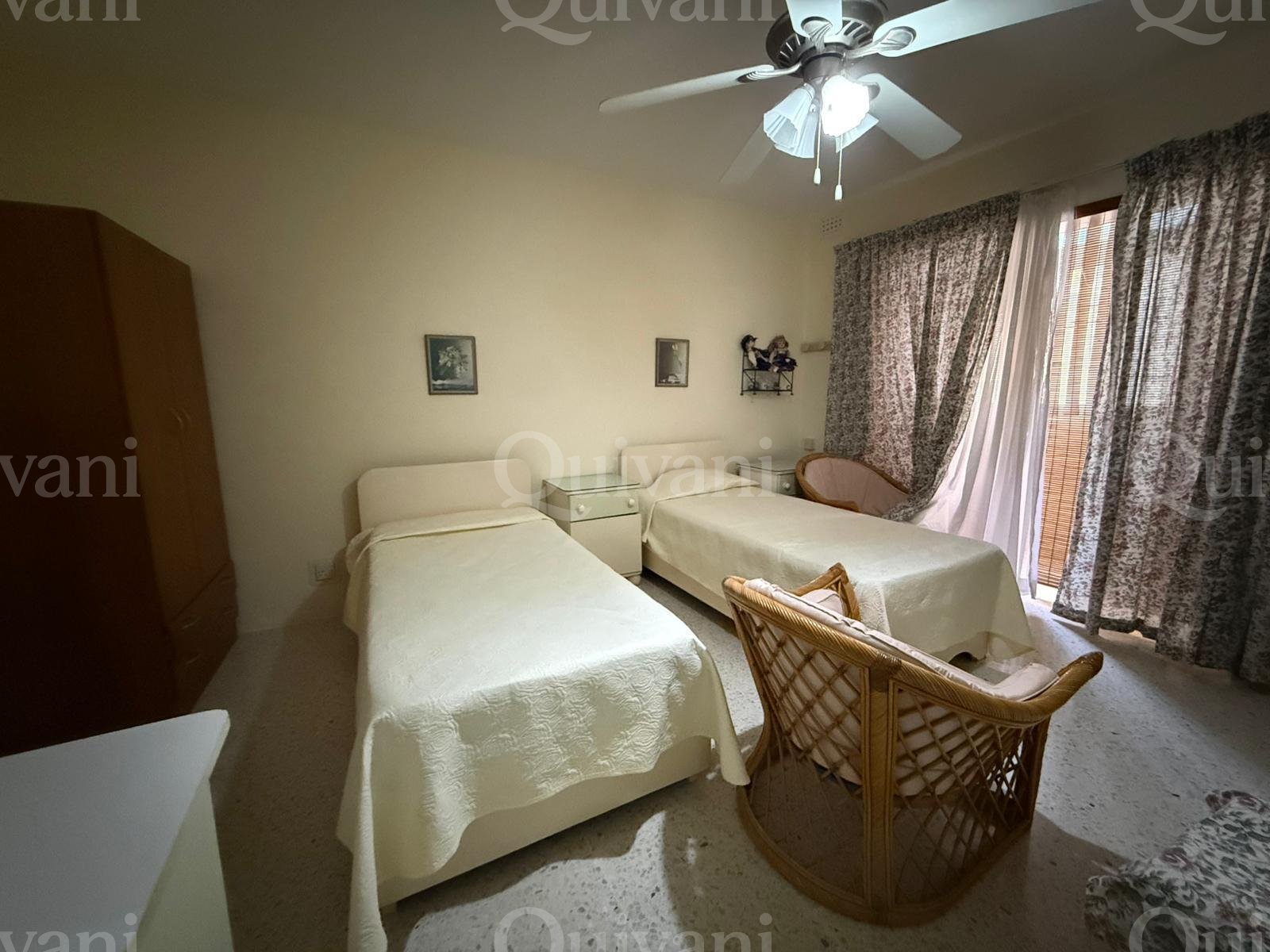 First floor apartment with an interconnecting street level garage and half ownership of airspace