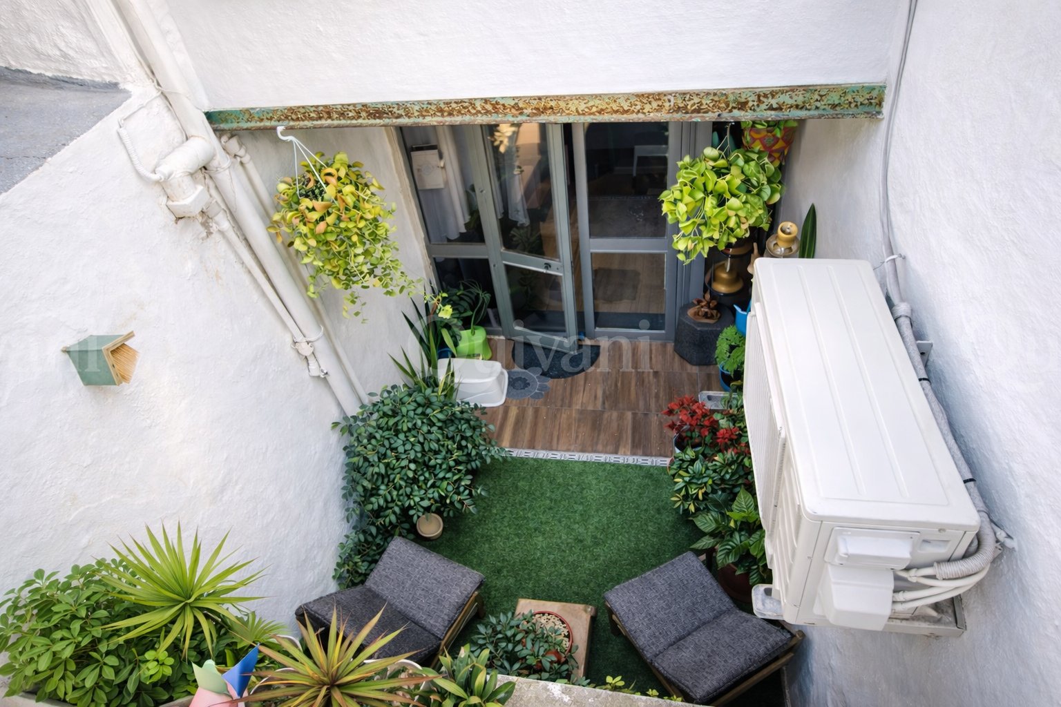 Paola, Semi-Converted Town House