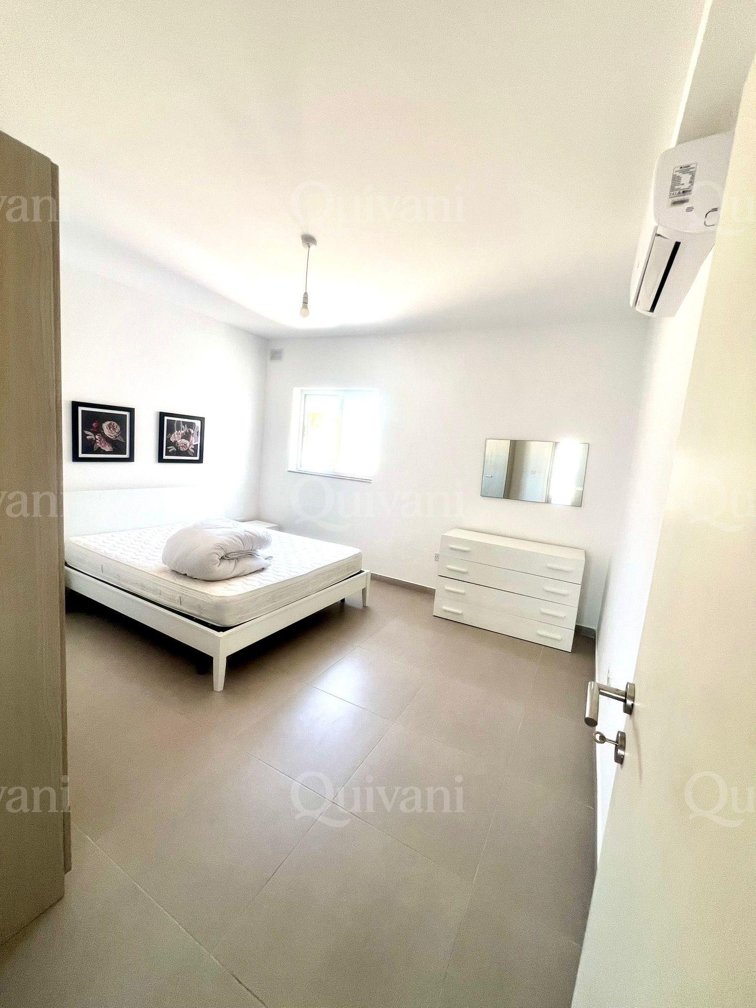 Spacious 2-Bedroom Apartment + Street-Level Garage