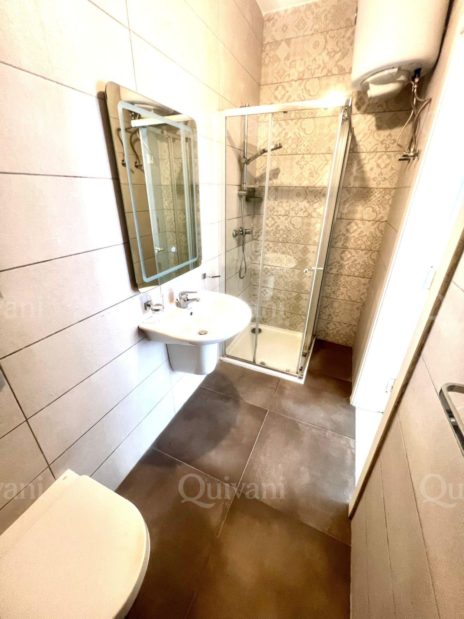 Spacious 2-Bedroom Apartment + Street-Level Garage
