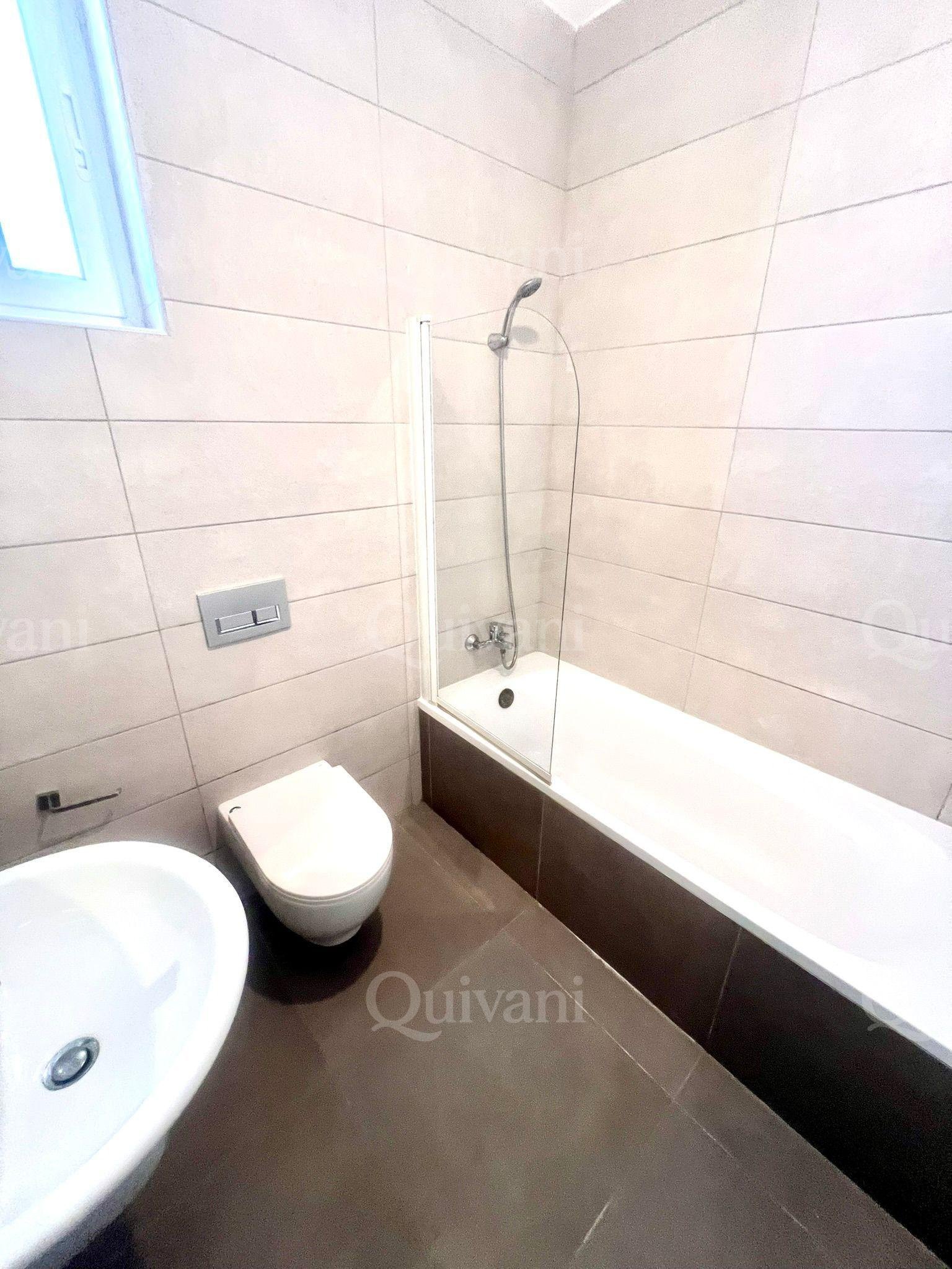 Spacious 2-Bedroom Apartment + Street-Level Garage