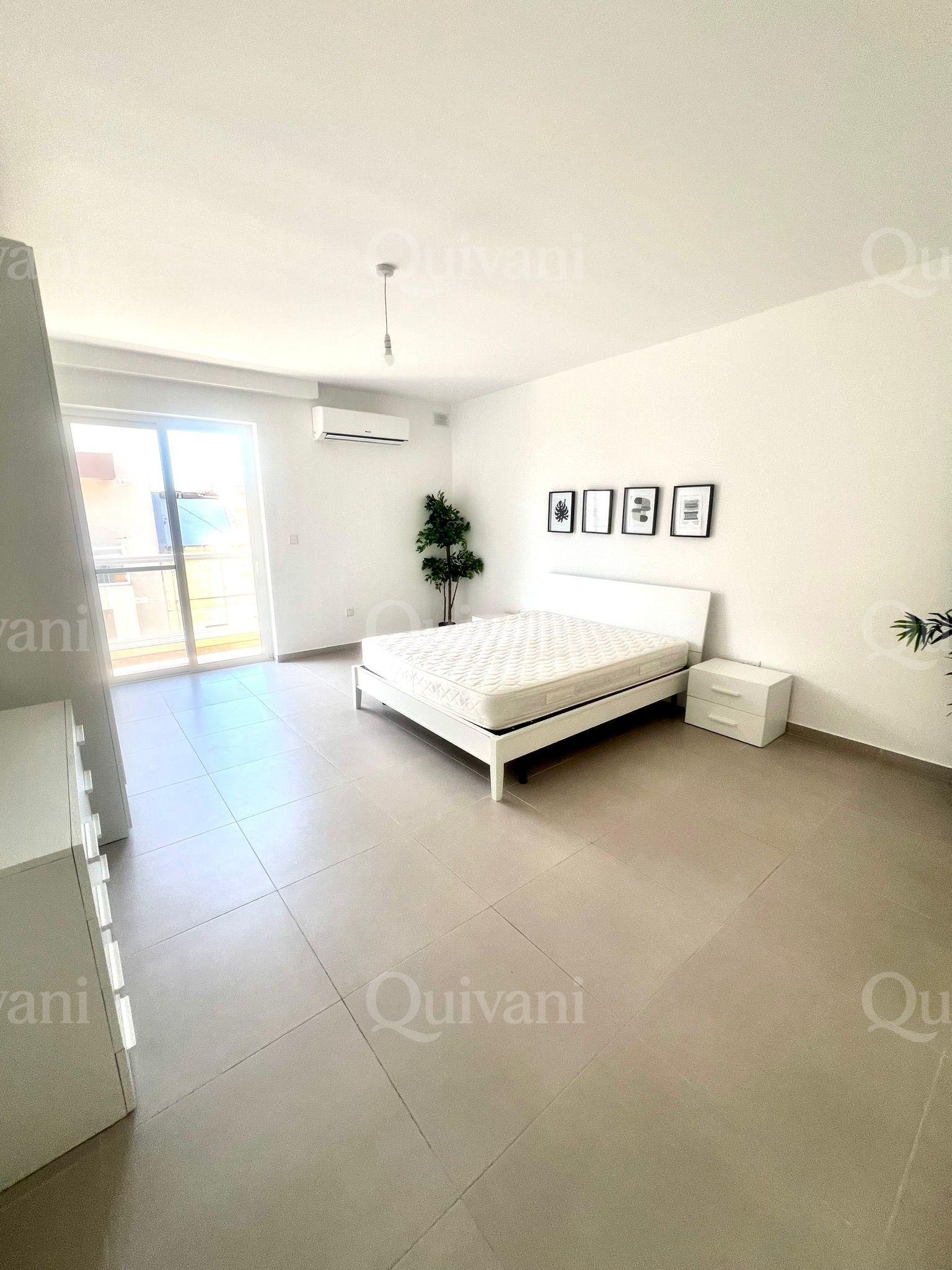 Spacious 2-Bedroom Apartment + Street-Level Garage