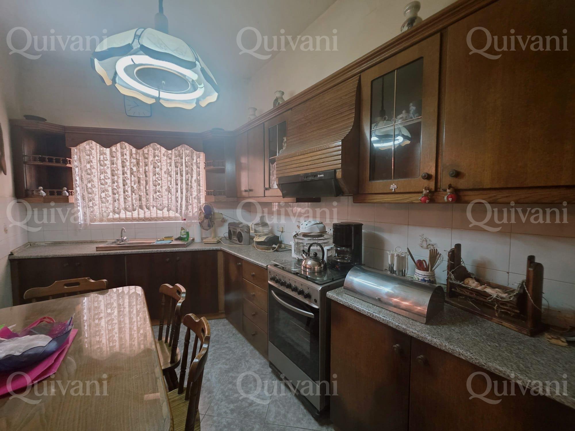 Kercem Terraced House