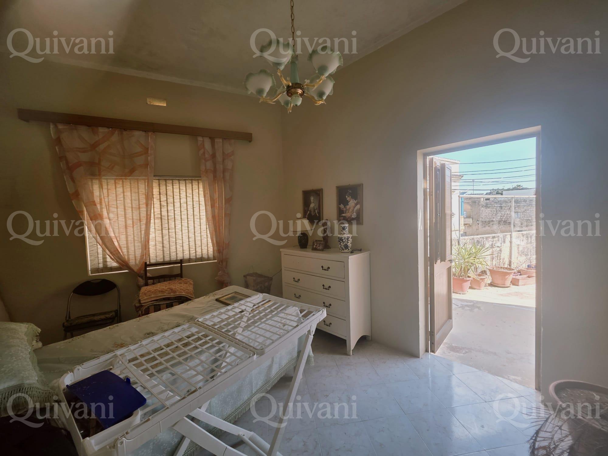 Kercem Terraced House