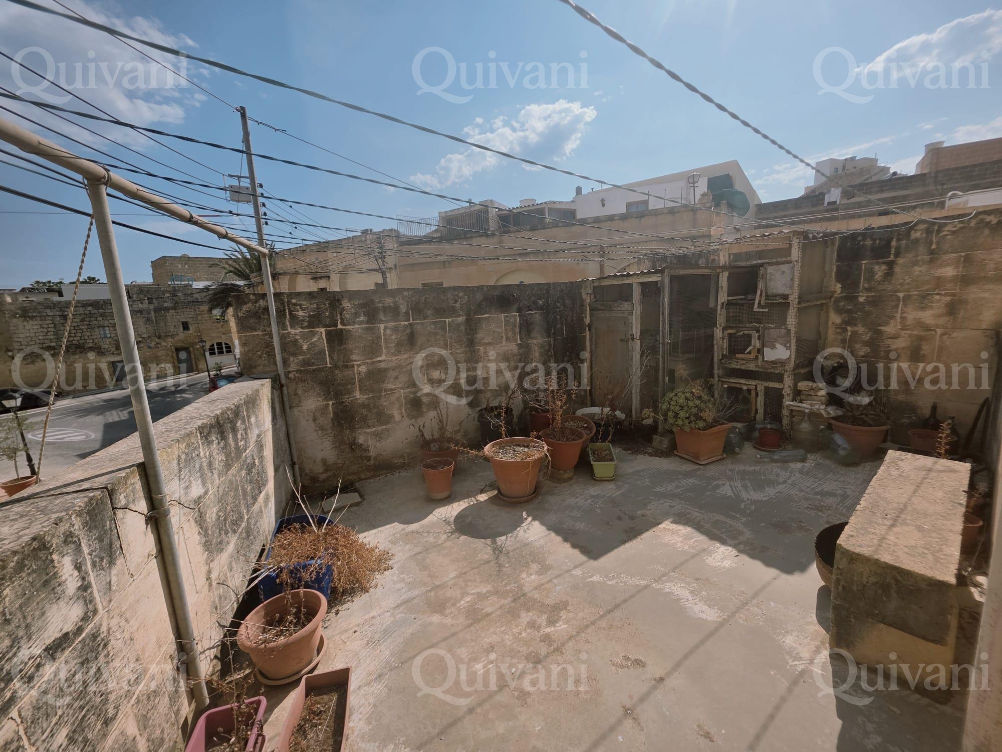 Kercem Terraced House